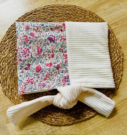 Détail couture pochette à livre fait main qualité artisanale